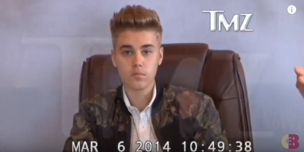 Justin Bieber sitting on an armchair