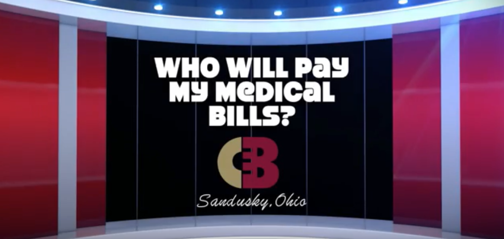 Boyk's logo and a sign that says "Who will pay my medical bills?"