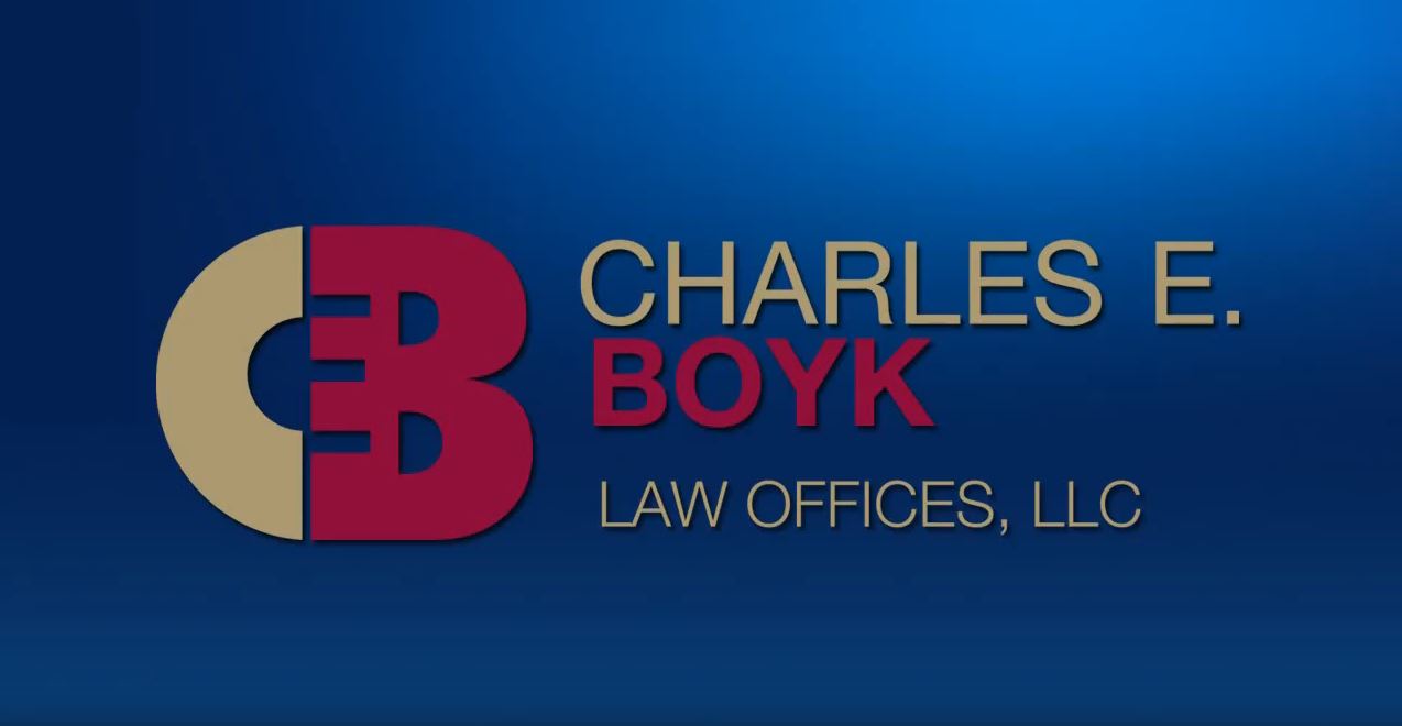 Charles Boyk logo, blue background