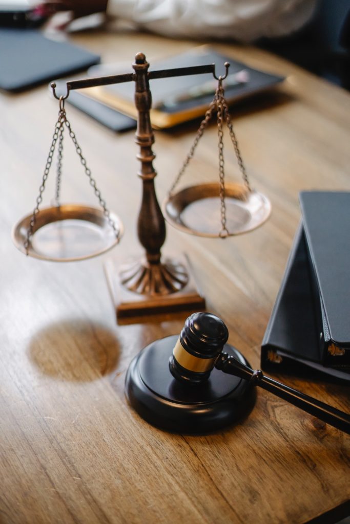 judge's gavel and scales on a desk